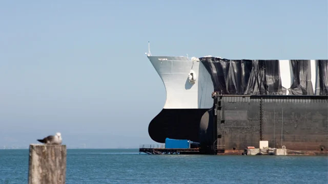 Ship moored in dry dock for service